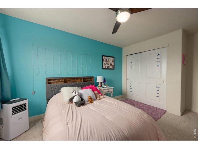 Property Photo 25 Secondary Bedroom Offers Large Closet Space