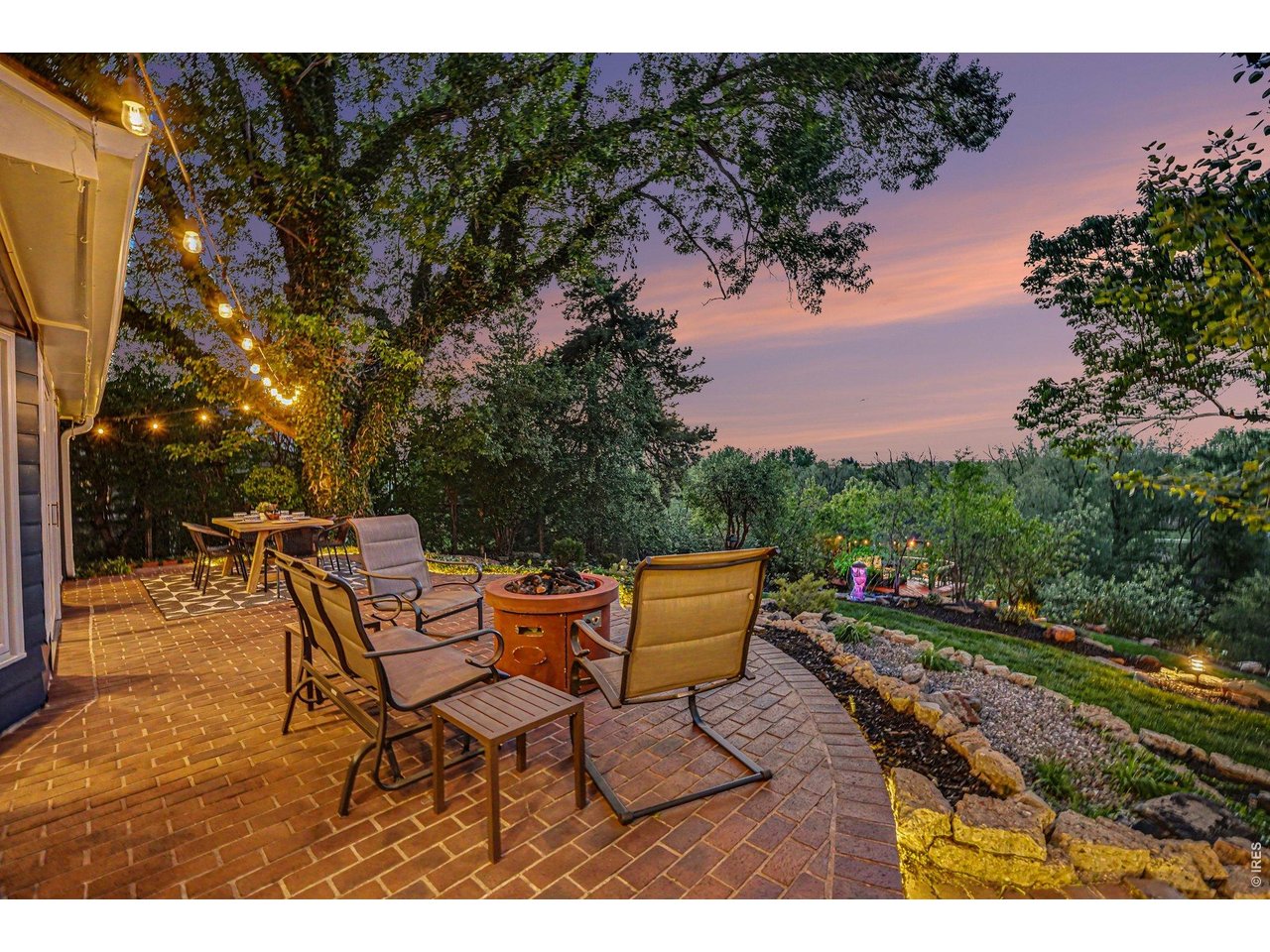 Relax in front of your fire pit as you take it in the beauty that is your outdoor space.