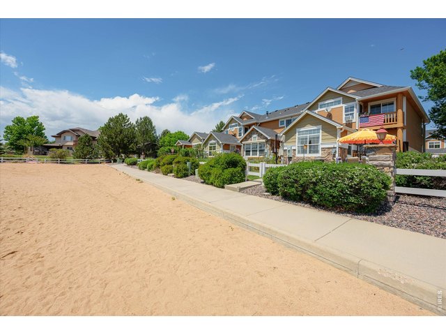 Property Photo 5 Beach is Only Accessible to Neighborhood Occupants. Walk to the Clubhouse to Enjoy Dinner or Play A Round of Golf!