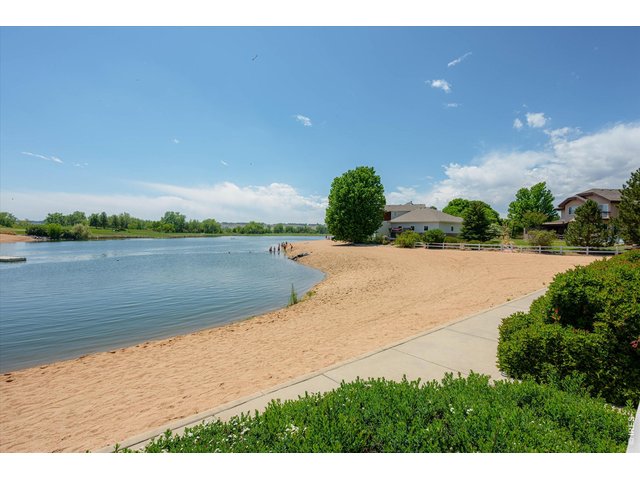 Property Photo 29 Mountain Views to the West & Walking Path-Enjoy the Many Pelicans that call this Lake Home!