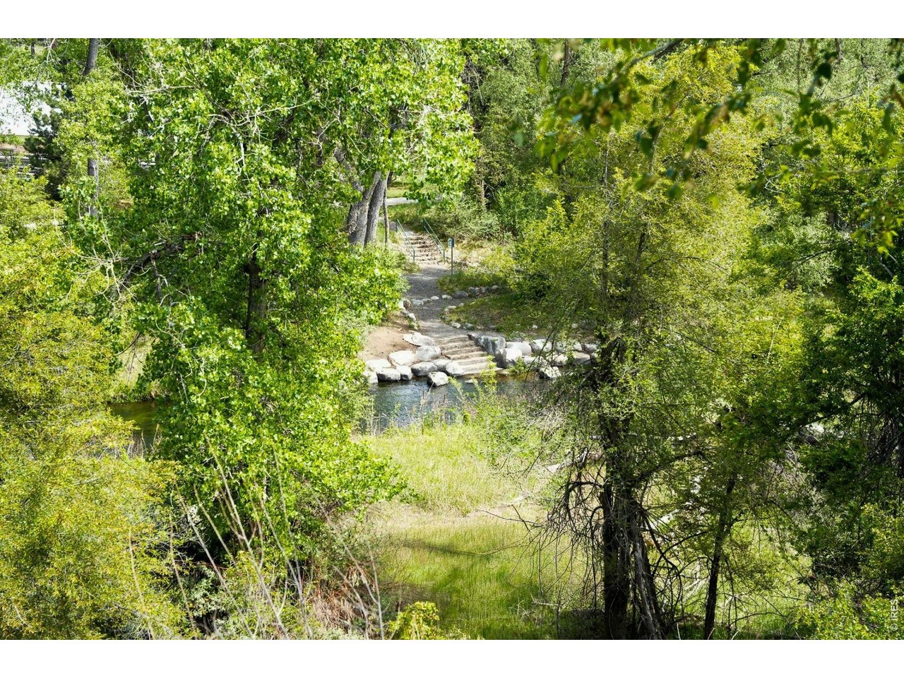 Nature right out your back door! Enjoy unparalleled, direct access to the Clear Creek River.