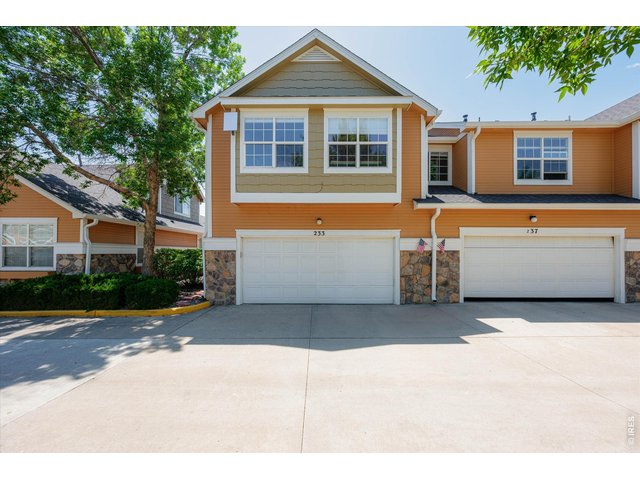 Property Photo 43 2 Car Attached Garage- Park your Golf Cart with Side Entrance to Fully Fenced Front Yard & Beach! Exterior Maintenance taken care of by HOA