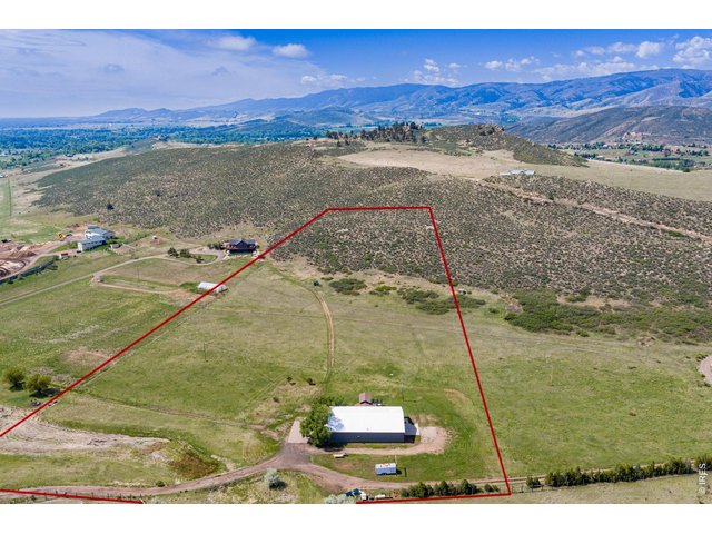 Property Photo 1 Private gates leads you to 10 Acres, Open Zoning, and a 5,089 Sq. Ft. Shop/Garage and ADU. 
