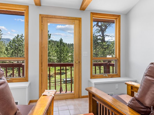 Property Photo 26 This is where I drink my morning coffee, watching the humming birds with Longs Peak as the back drop