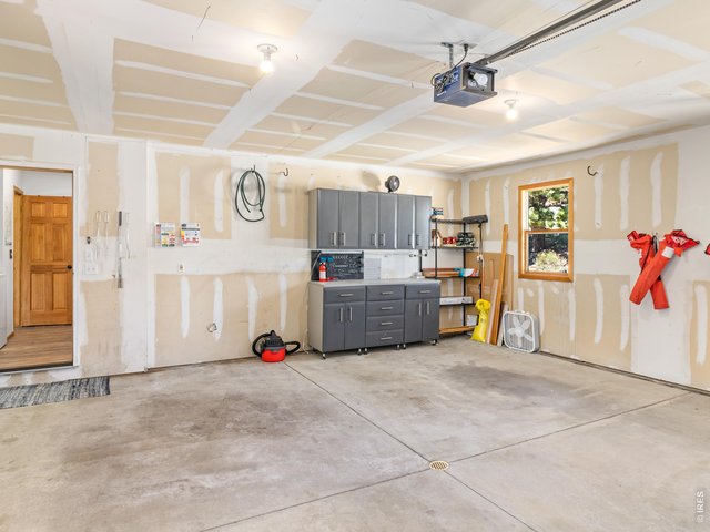 Property Photo 48 oversized 2 car attached garage with work bench