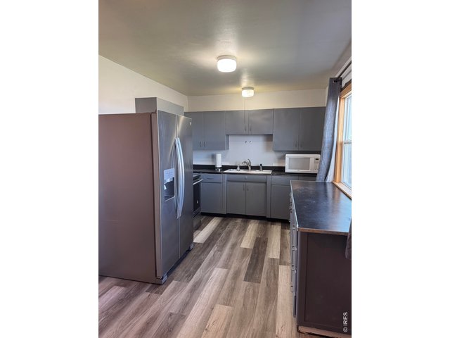 Property Photo 19 New flooring in kitchen