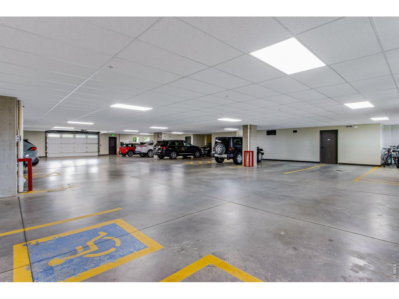 Fully insulated, finished secure parking garage, 2 car tandem space and separate private storage just outside main level lobby door! 