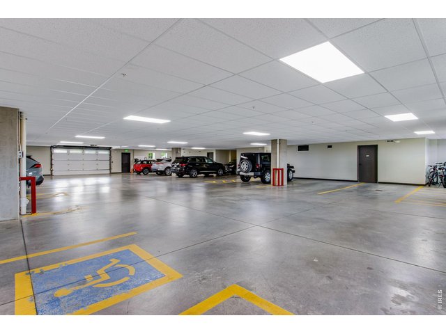 Property Photo 25 Fully insulated, finished secure parking garage, 2 car tandem space and separate private storage just outside main level lobby door! 