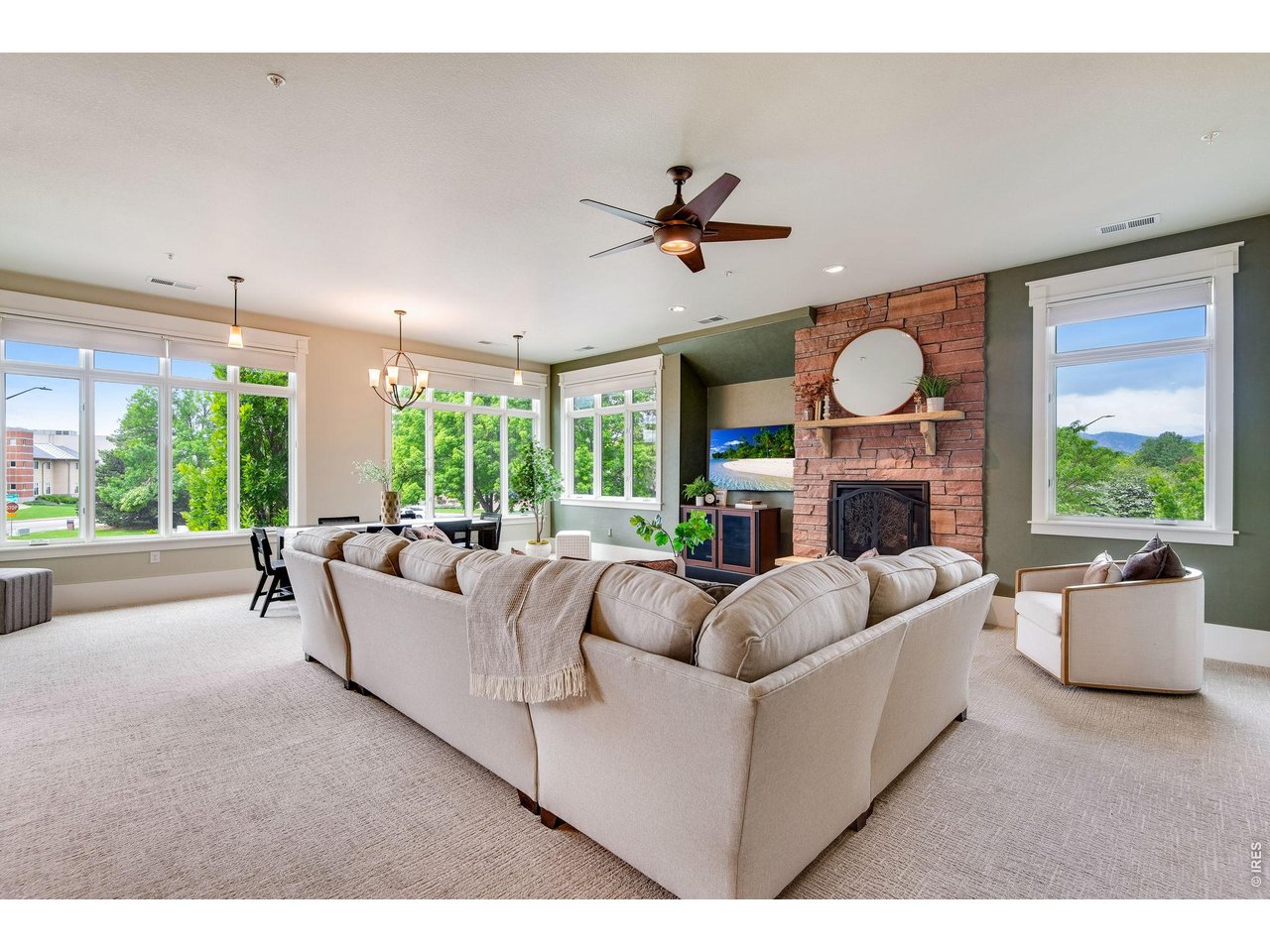 West side location provides stunning evening sunsets, oversized full flagstone gas fireplace and blower.