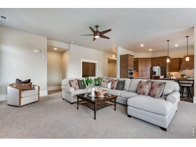 Property Photo 13 Volume ceilings and plush new carpet in 2024! 