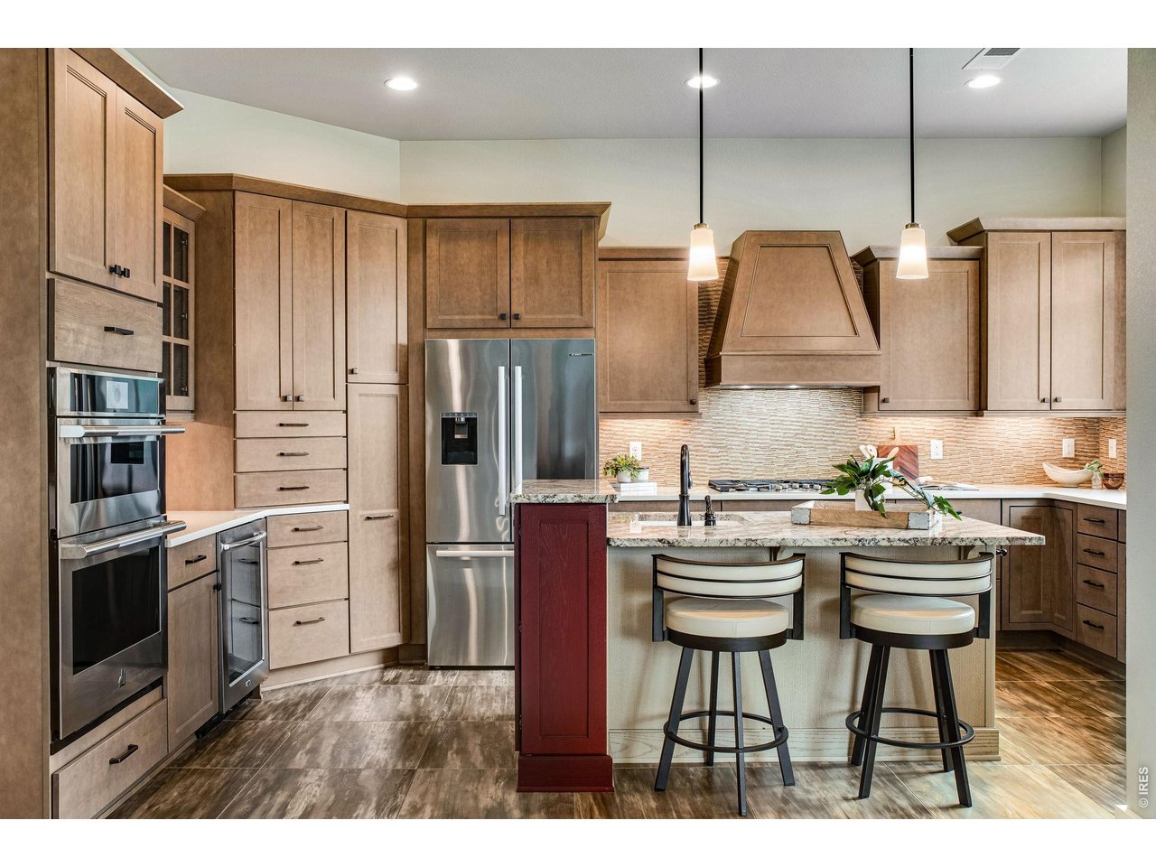 Bathed in natural light Perfectly outfitted, large format tile flooring, filled with character! 