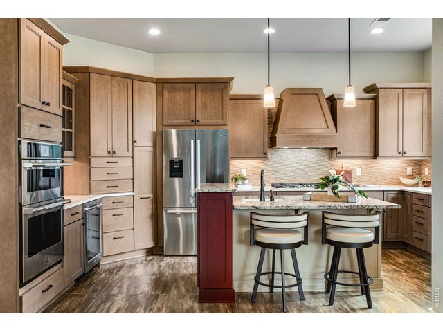 Property Photo 21 Bathed in natural light Perfectly outfitted, large format tile flooring, filled with character! 