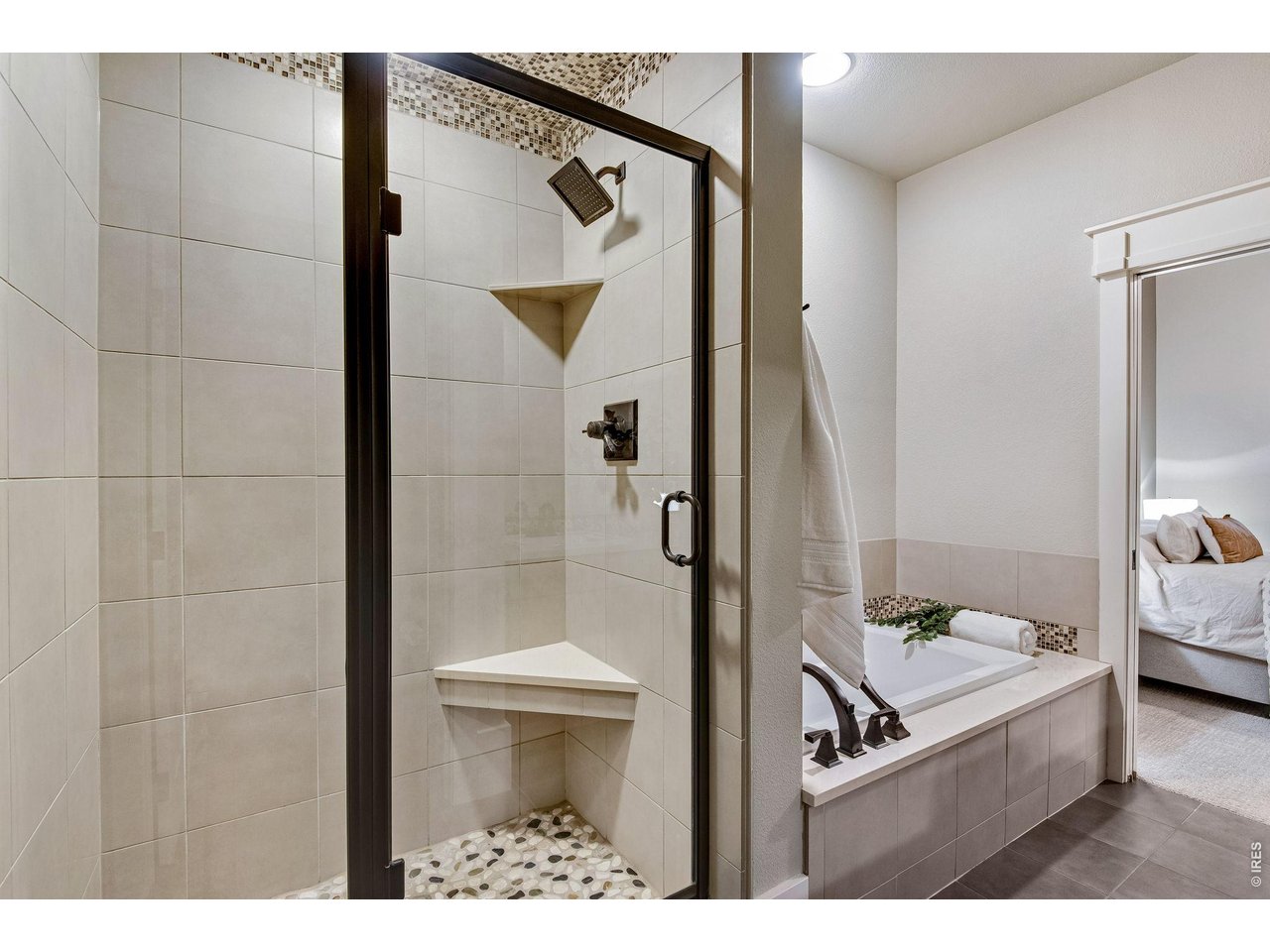 Full 5 piece bathrooms with stunning tile work and poured pan shower floors! 
