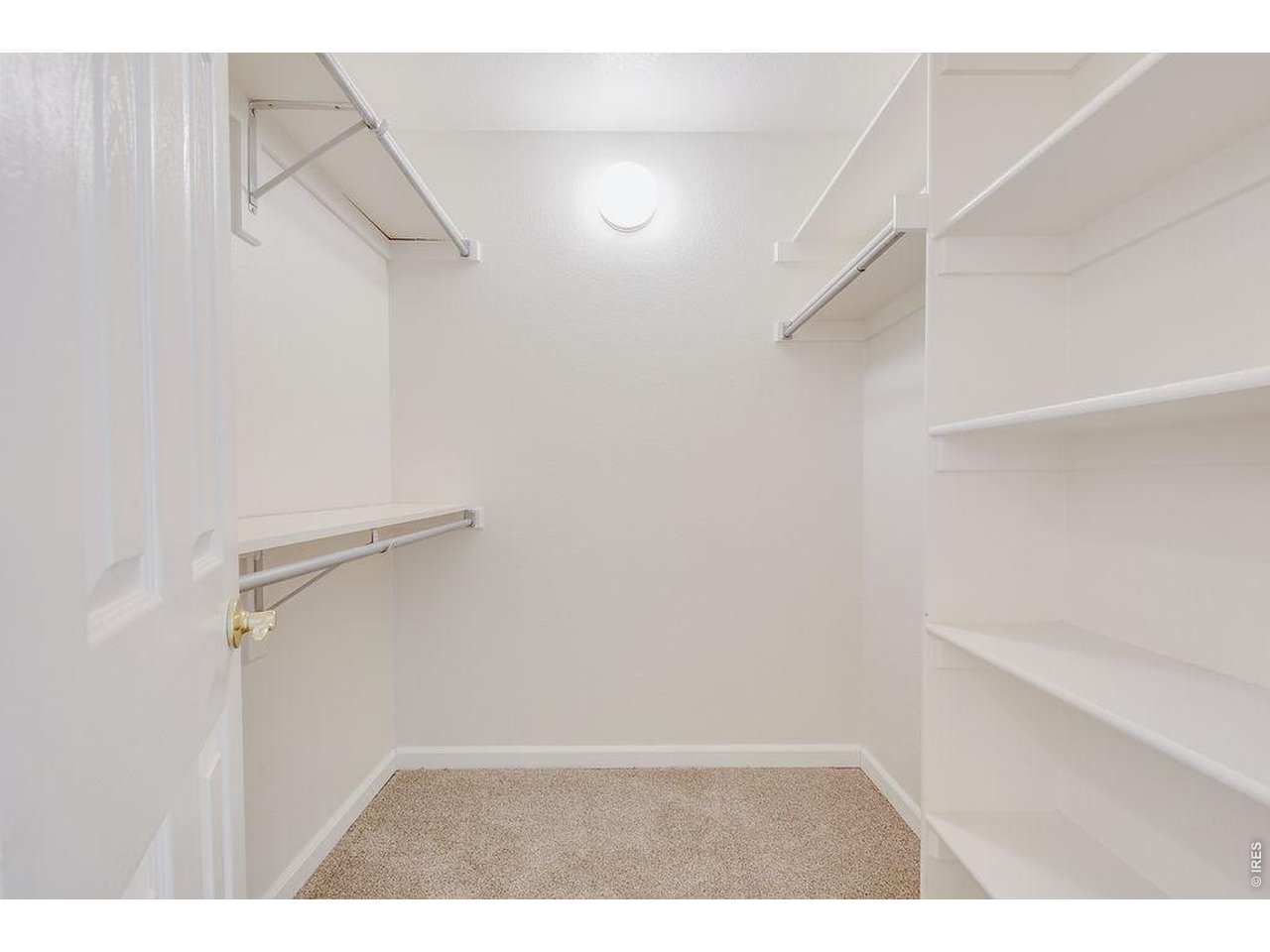 Spacious walk-in primary suite closet