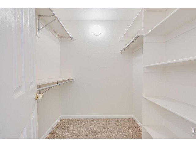 Property Photo 21 Spacious walk-in primary suite closet