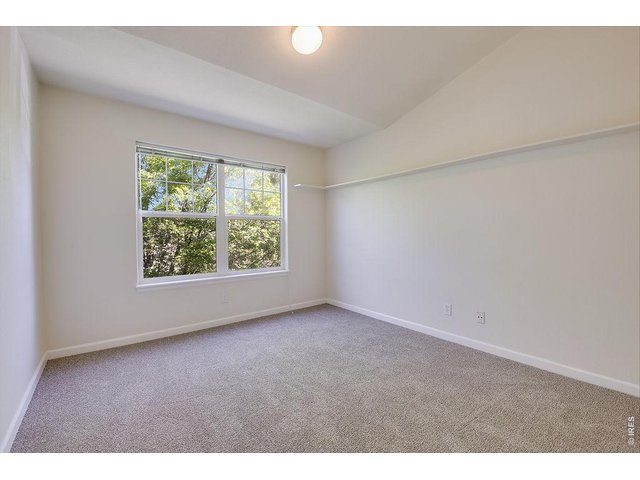 Property Photo 22 Guest Room w/ Vaulted Ceilings