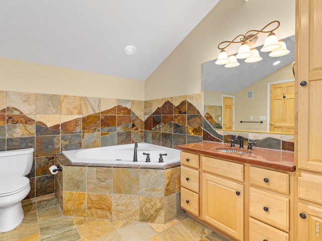 Property Photo 33 Custom tile bath