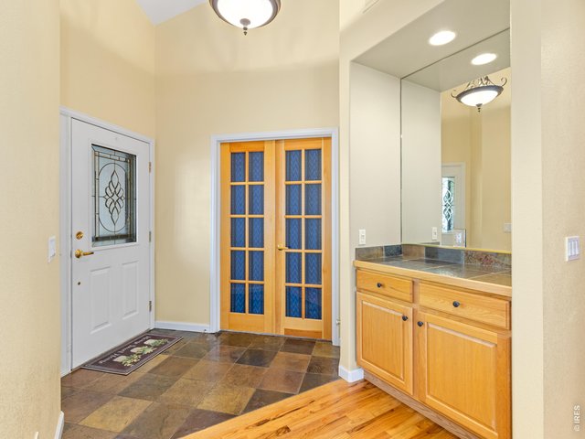 Property Photo 16 Entryway and French doors to office/bedroom 3