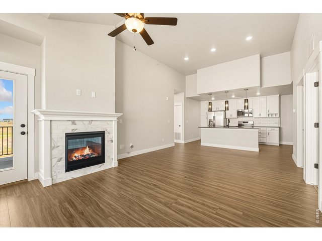 Property Photo 7 Ceiling fan and fireplace included! 
