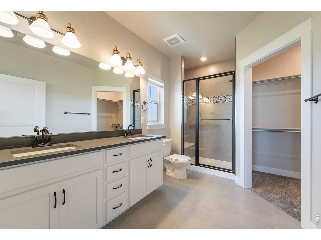 Property Photo 10 Primary bathroom with dual vanities