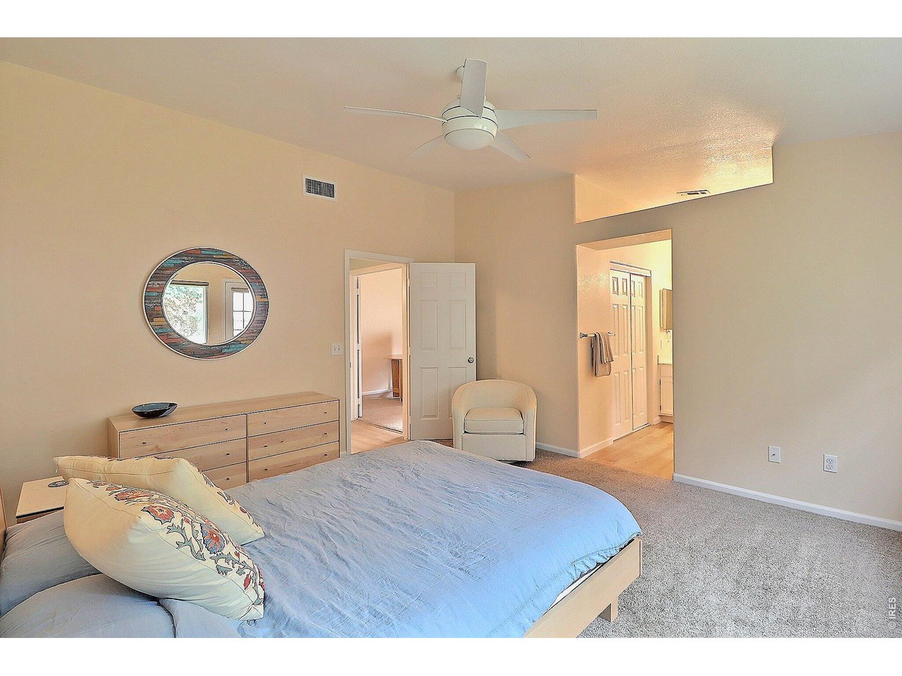 Lovely Primary Bedroom with Tall Ceiling Details