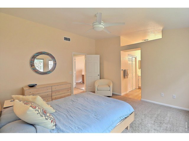 Property Photo 21 Lovely Primary Bedroom with Tall Ceiling Details