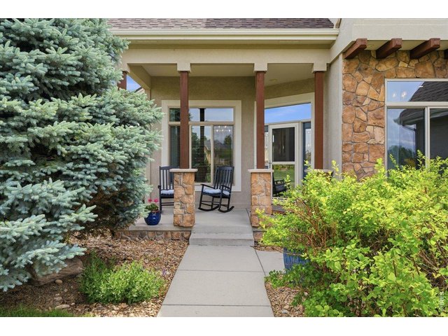 Property Photo 4 Charming covered front porch to watch the Colorado sunsets