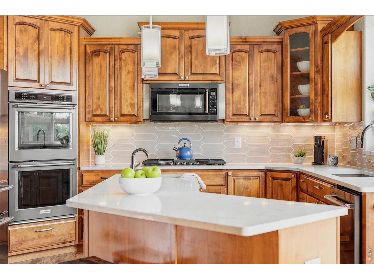 Quartz countertops and designer backsplash
