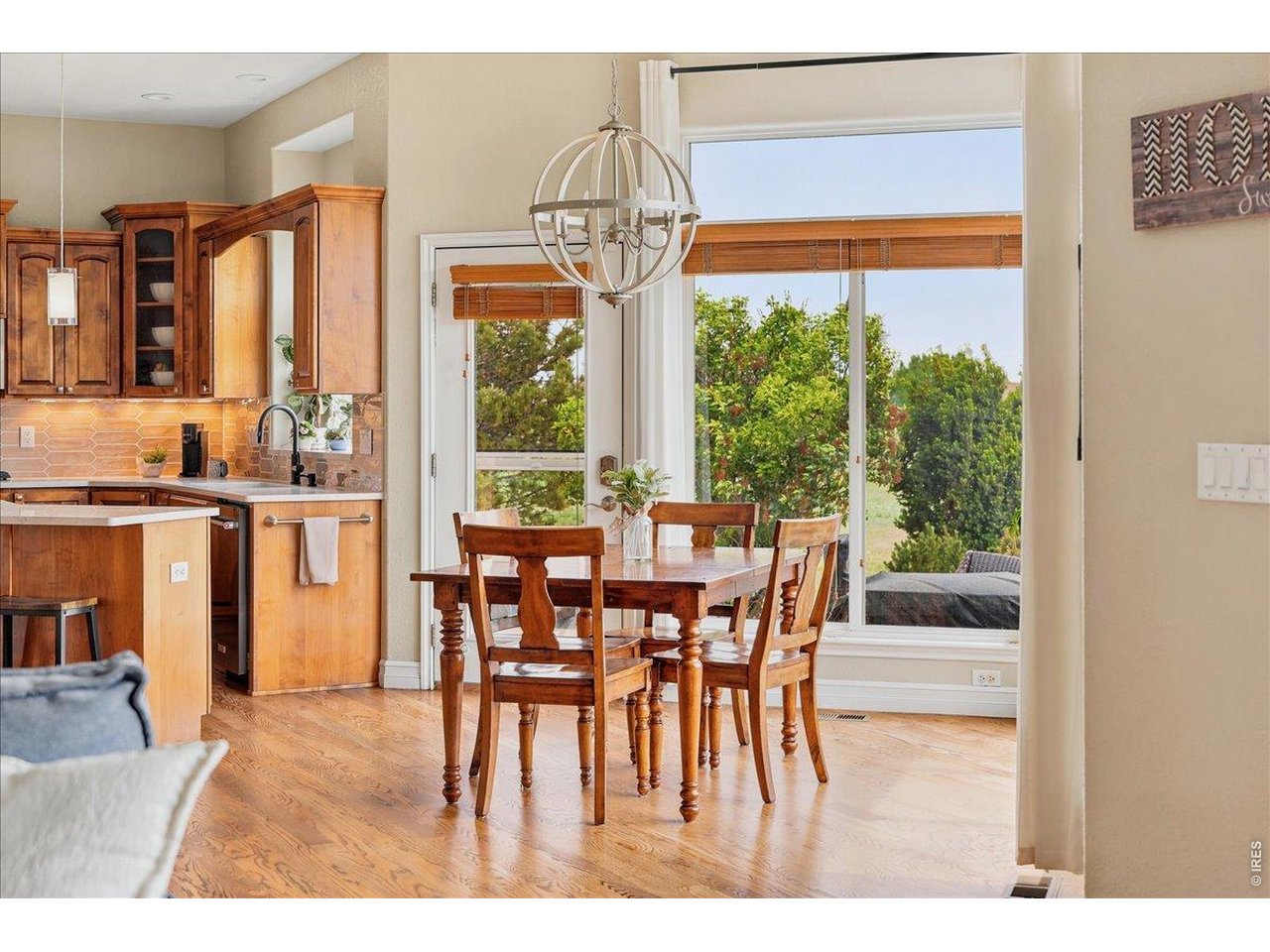 Breakfast nook that looks out on to manicured yard