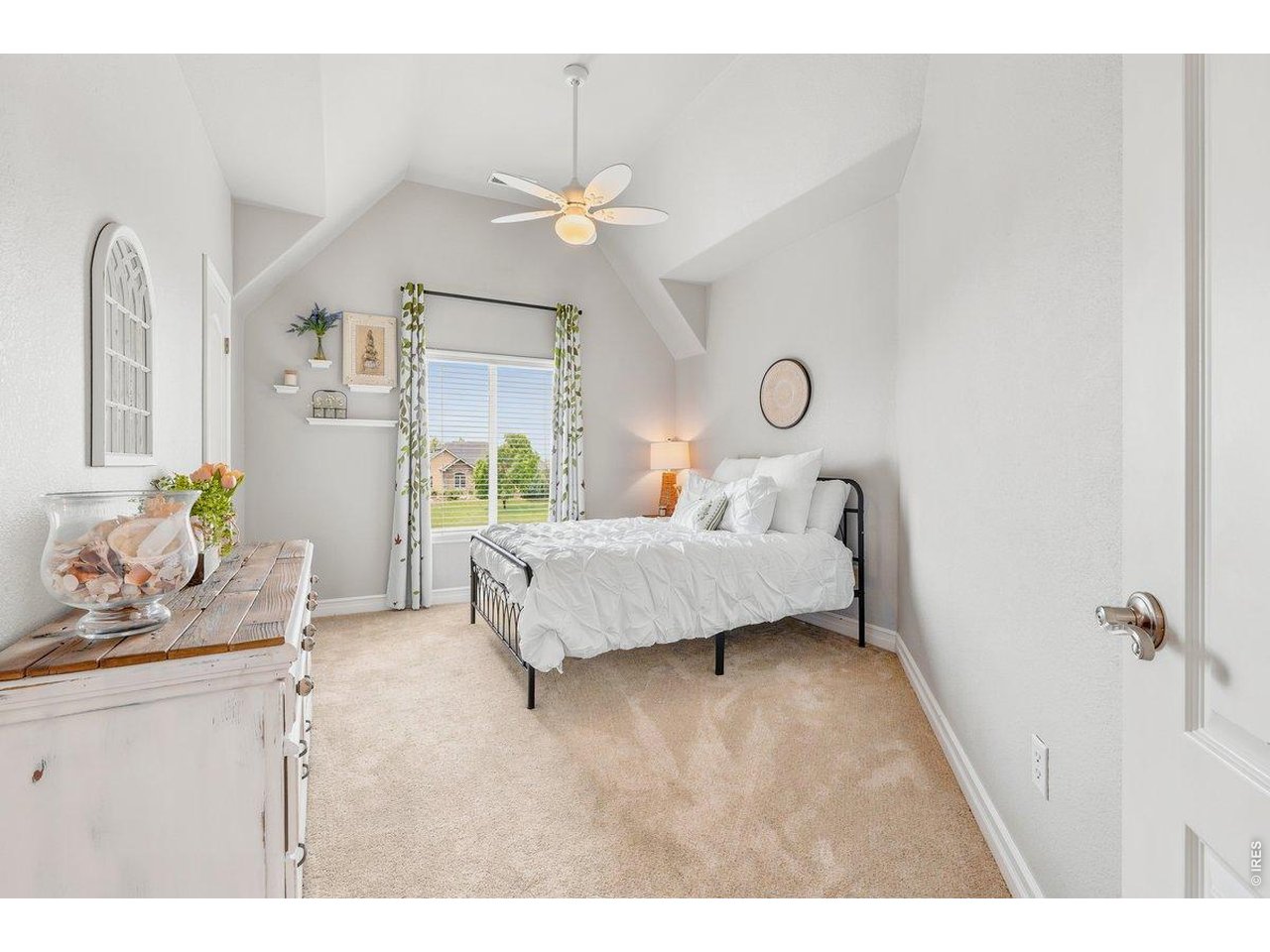 Fourth bedroom with tall ceilings and no shortage of charm