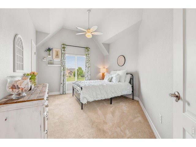 Property Photo 35 Fourth bedroom with tall ceilings and no shortage of charm