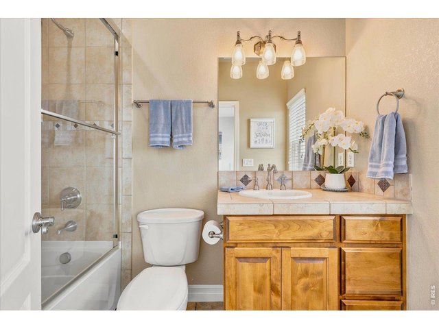 Property Photo 31 Ensuite bathroom with tiled shower