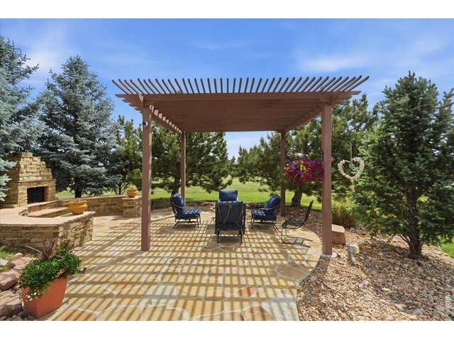 Property Photo 45 Tranquil pergola is the perfect spot on a beautiful summer night