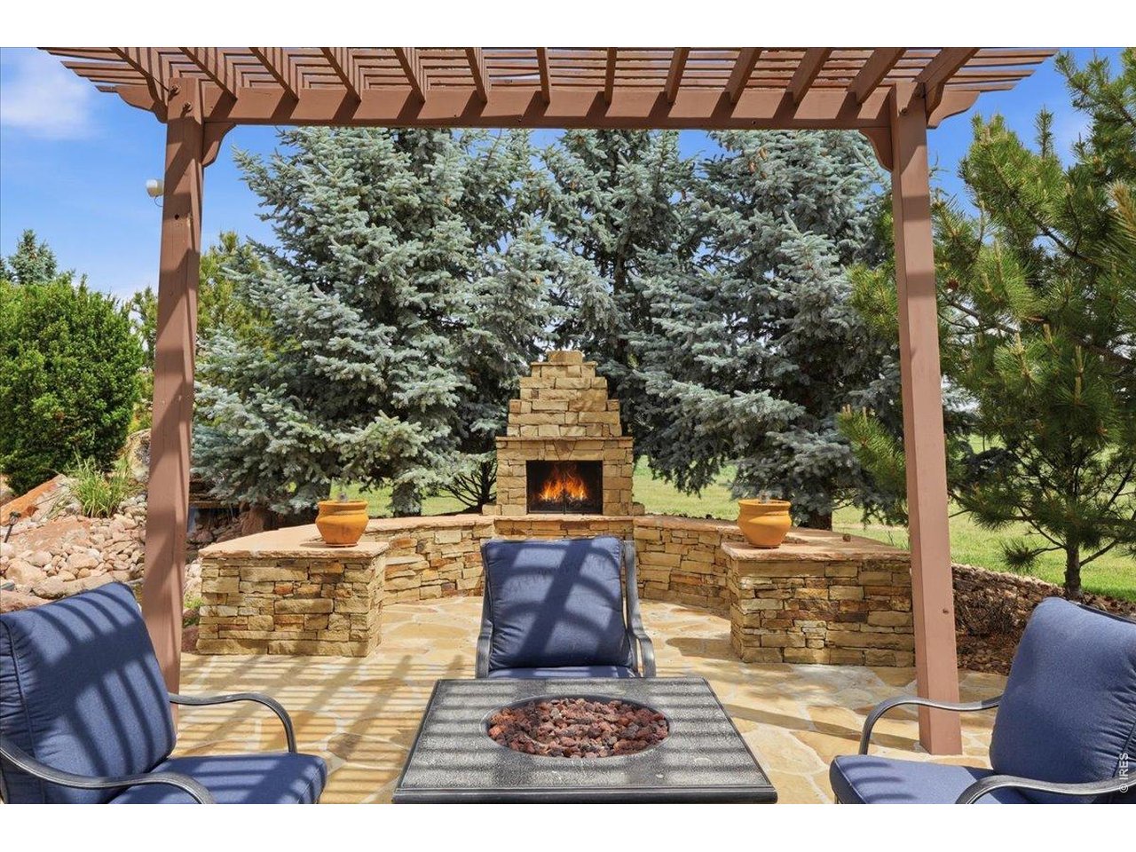 Zen outdoor oasis with gas fireplace