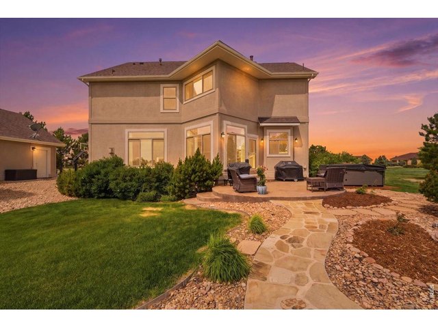 Property Photo 46 Two tiered patio with pristine landscaping