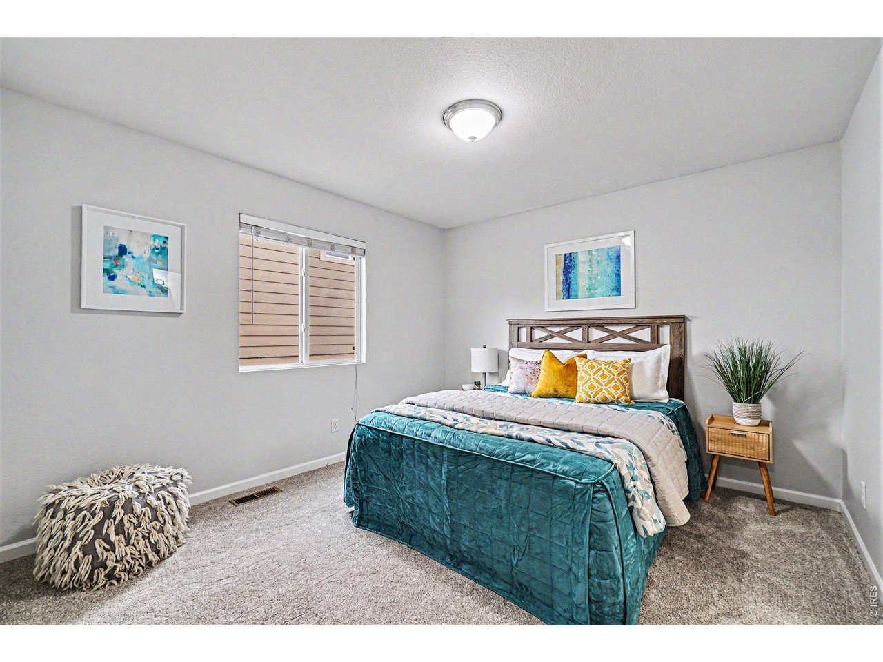Spacious Primary Suite with a private en suite bath and walk in closet 