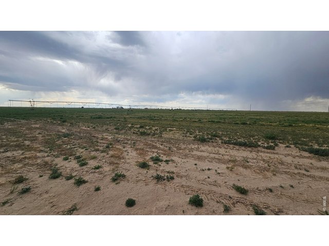 Property Photo 20 Sprinkler and northwest view