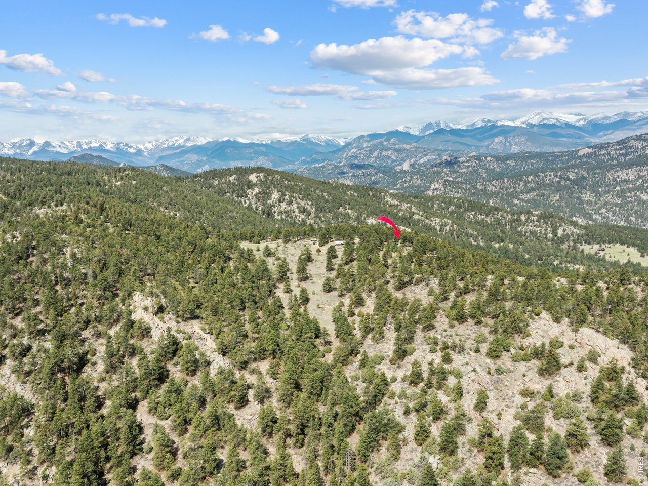 Looking West. Yurt at red arrow.