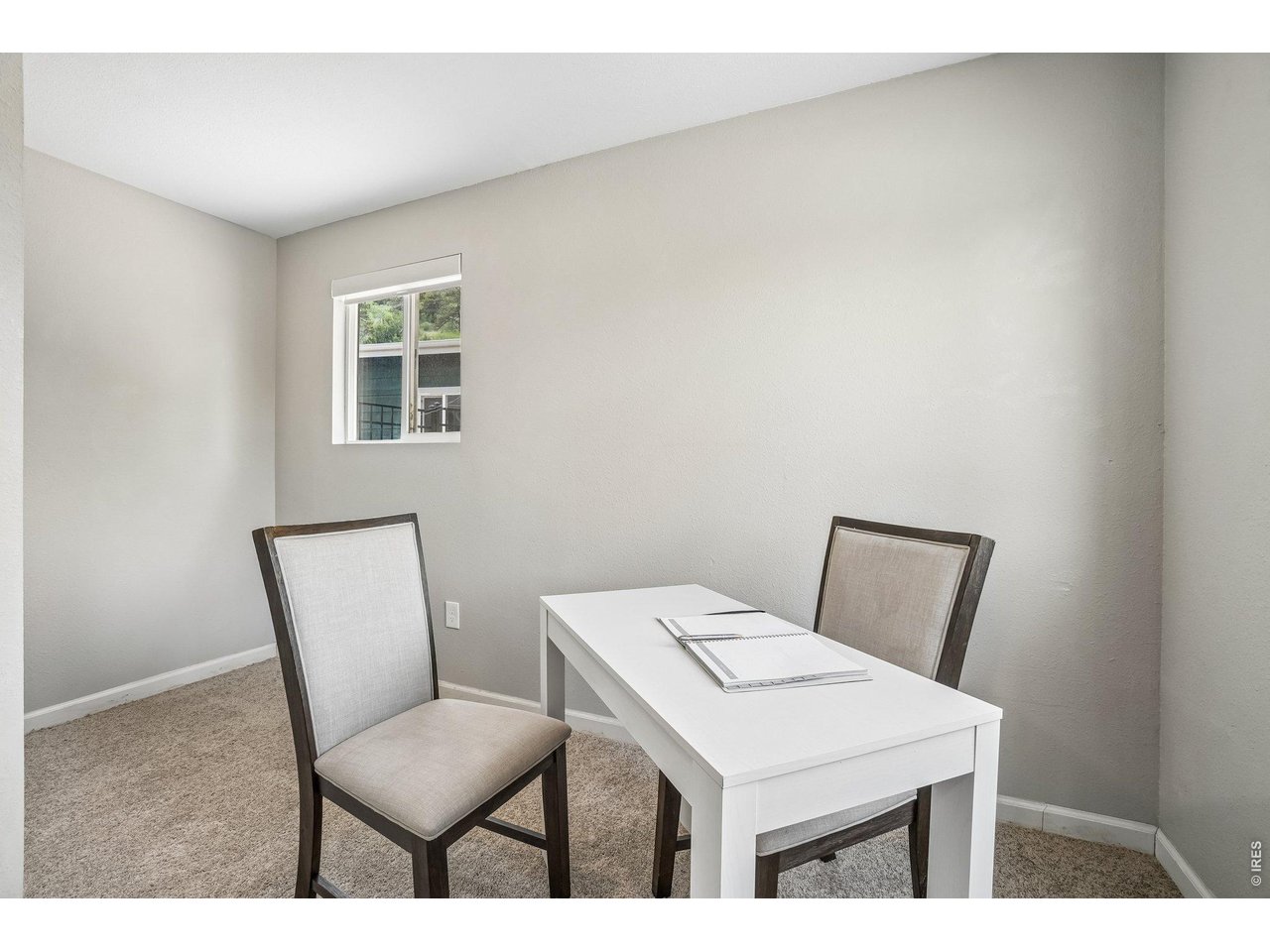 Property Photo 31 Hidden bookshelf-style Murphy door leads to a private office or flex space