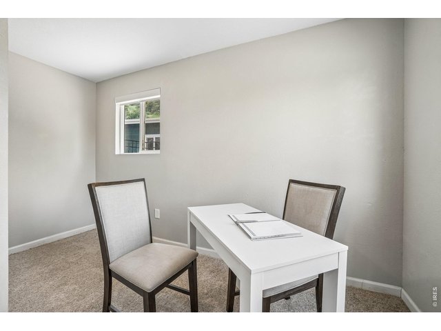 Property Photo 31 Hidden bookshelf-style Murphy door leads to a private office or flex space