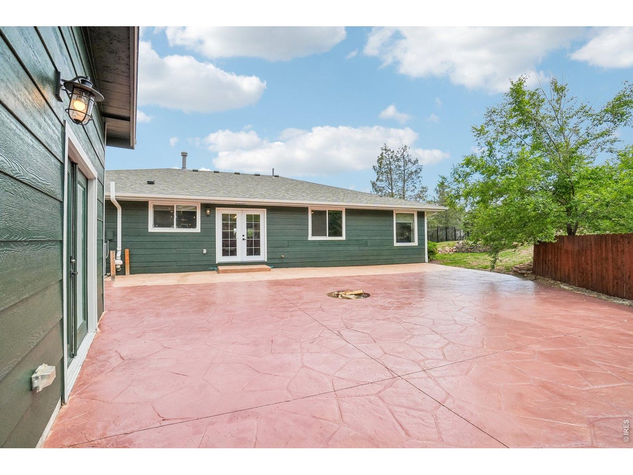 Property Photo 4 Firepit in the stamped concrete patio