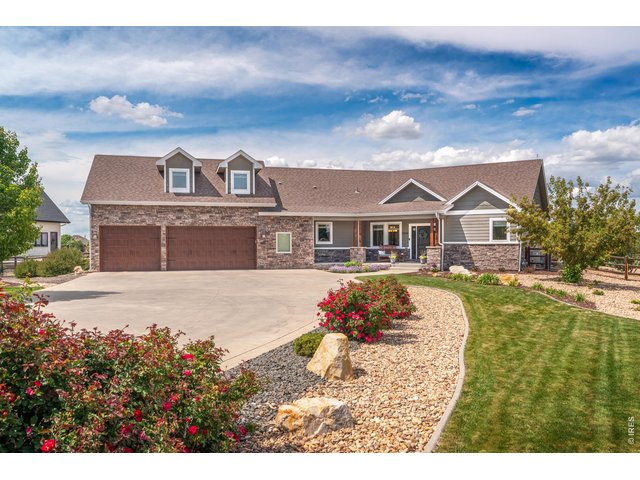 Property Photo 8 Custom built with an oversized 3 car garage