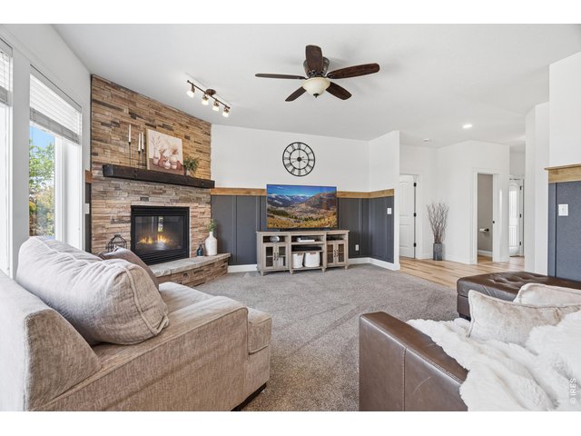 Property Photo 17 Floor to ceiling stone fireplace in the living room