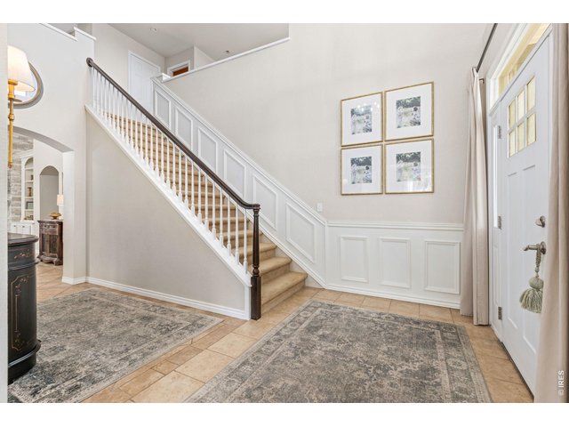 Property Photo 9 Grand Foyer With High Ceilings