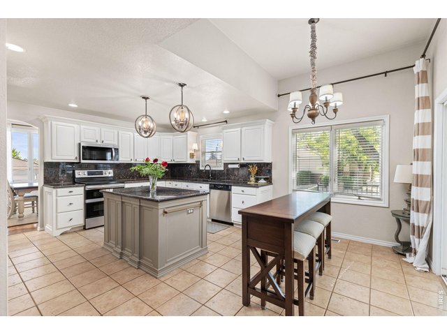 Property Photo 14 Remodeled Kitchen Flows Right Into Formal Dining Room to the Left