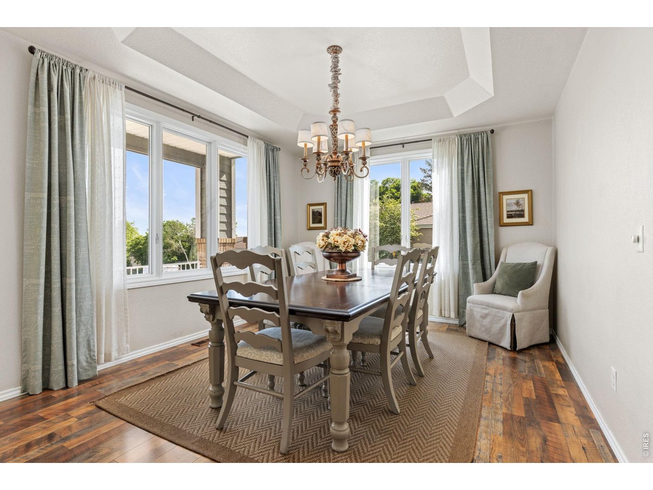 Enjoy Meals with Friends and Family in the Elegant Dining Room With Tray Ceiling