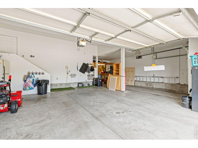 Property Photo 35 Oversized 810 Sq Ft Fully Drywalled 3 Car Garage With Shop Area