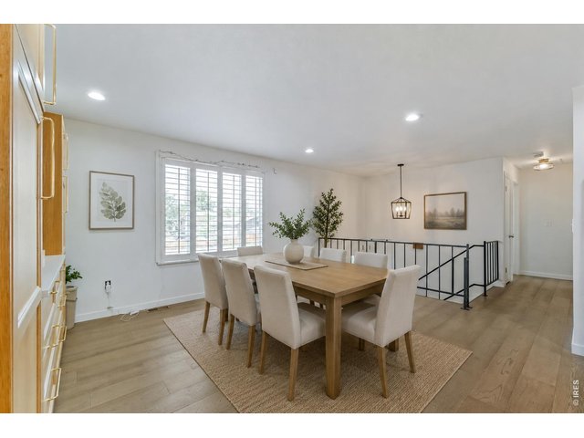 Property Photo 4 Digitally staged photo of dining room.