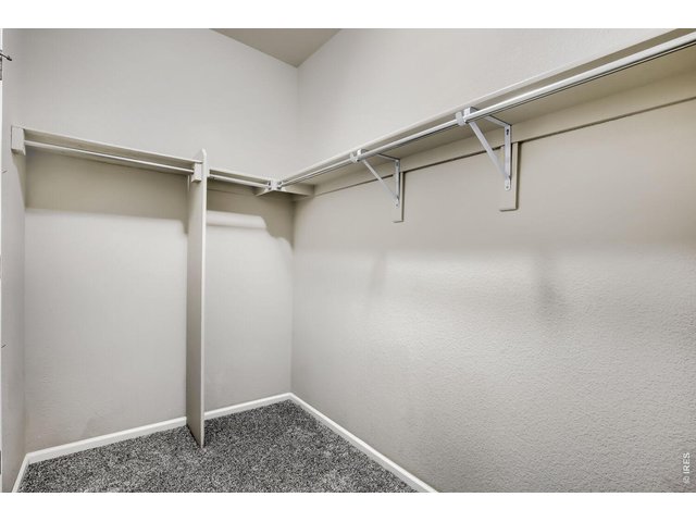 Property Photo 20 Primary walk-in closet