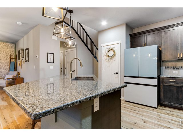 Property Photo 10 Large pantry, custom Milarc European style alder cabinetry with black walnut finish